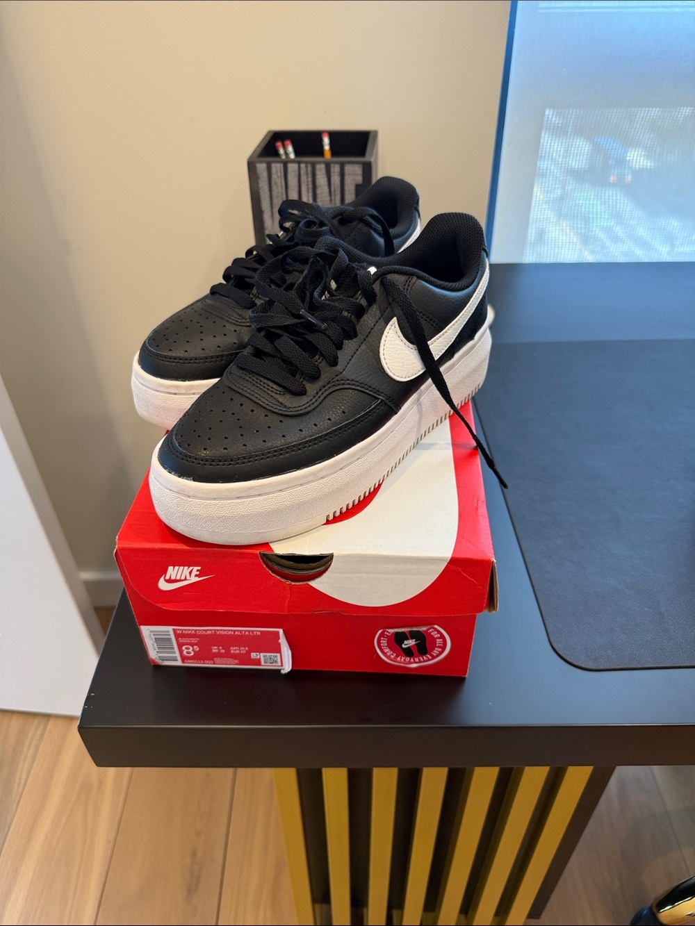 Nike women’s Black & White Low-Top Platform Sneakers